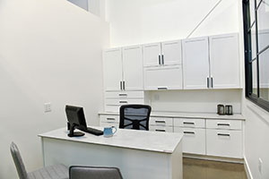 Contemporary white cabinetry in our Design Studio