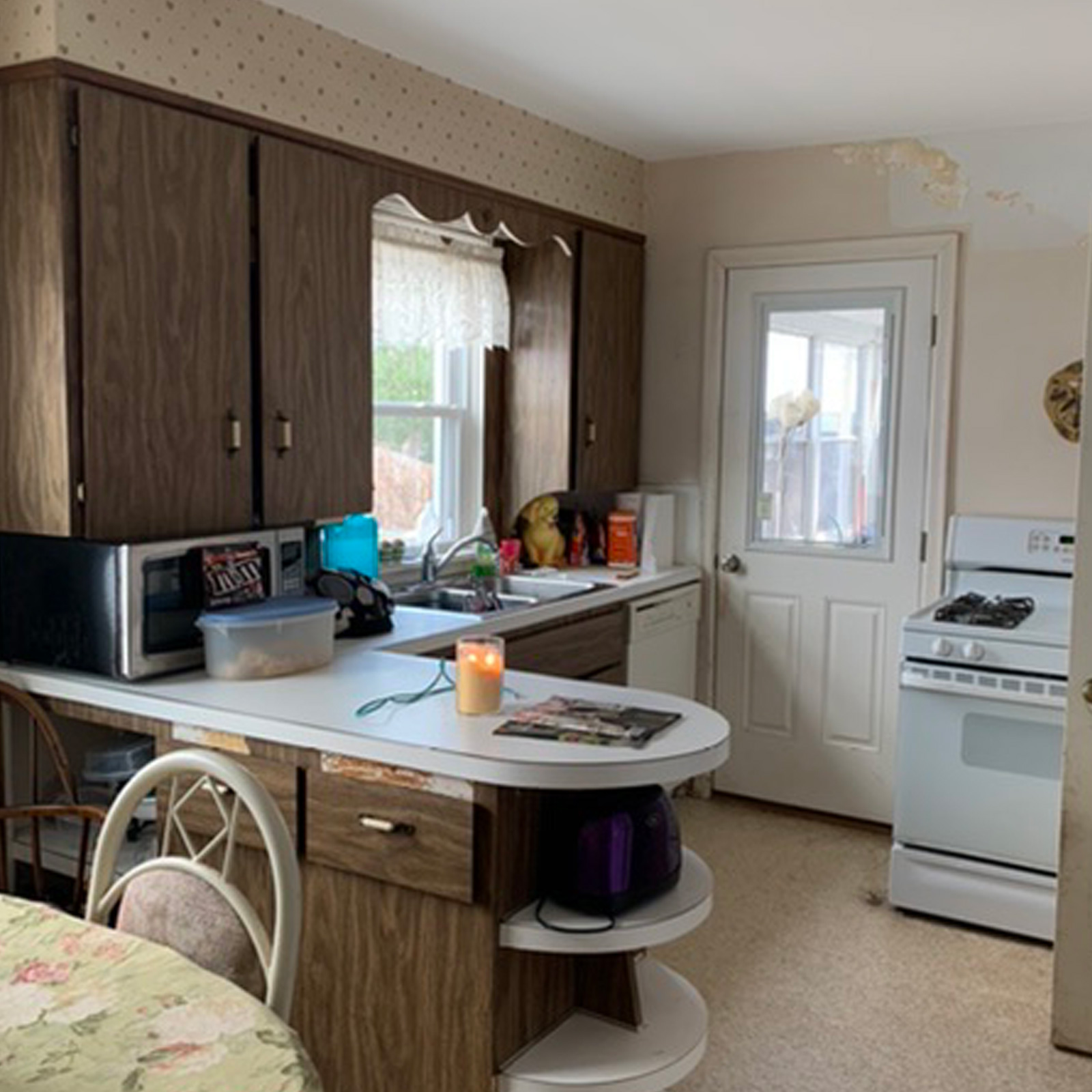 Entry 102 - This outdated kitchen could be transformed into a beautiful room