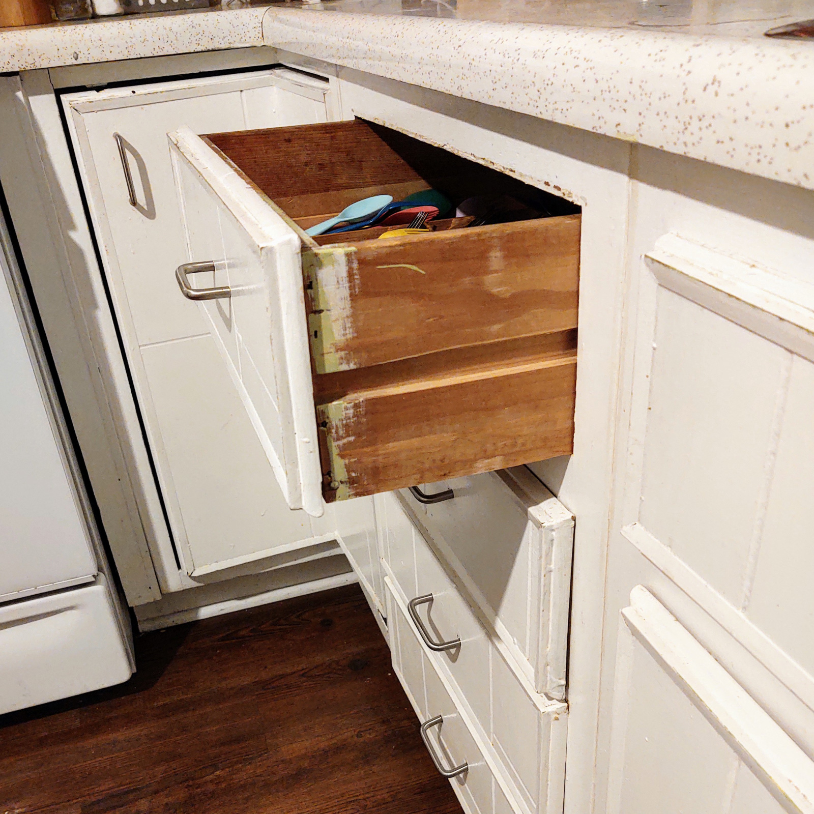 Entry 161 - The wear & tear on these cabinets set the stage for the entire kitchen