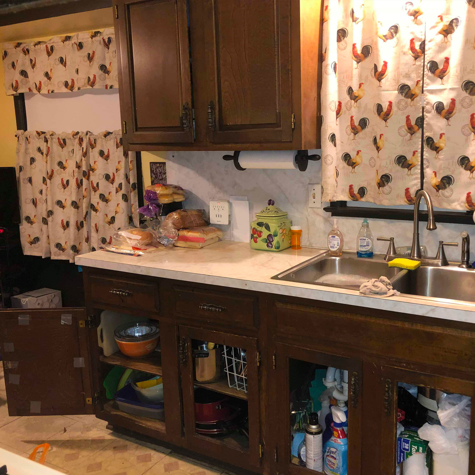 Entry 177 - These cabinets are mismatched, broken, taped & missing