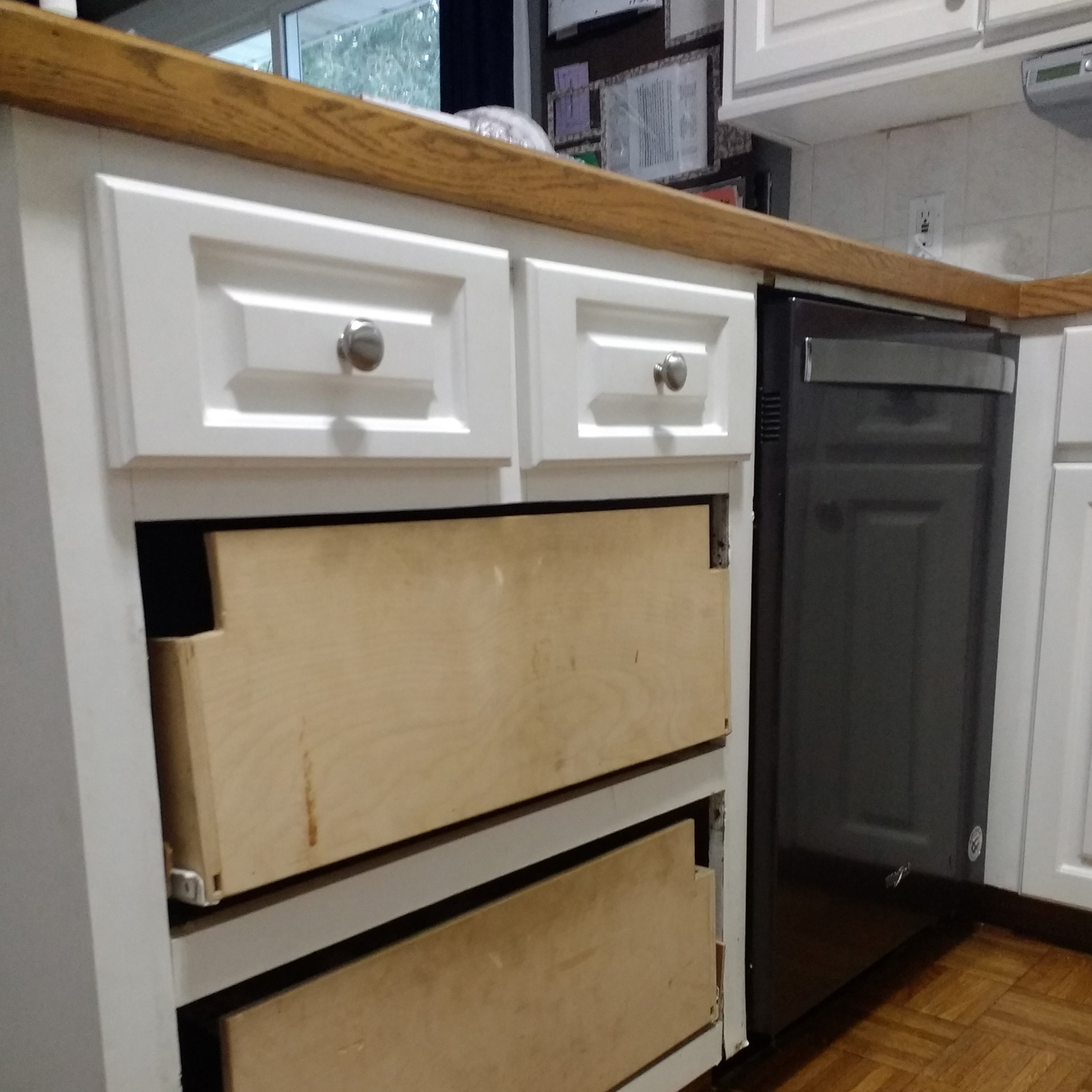 Entry 182 - Missing cabinetry makes for an unsightly kitchen