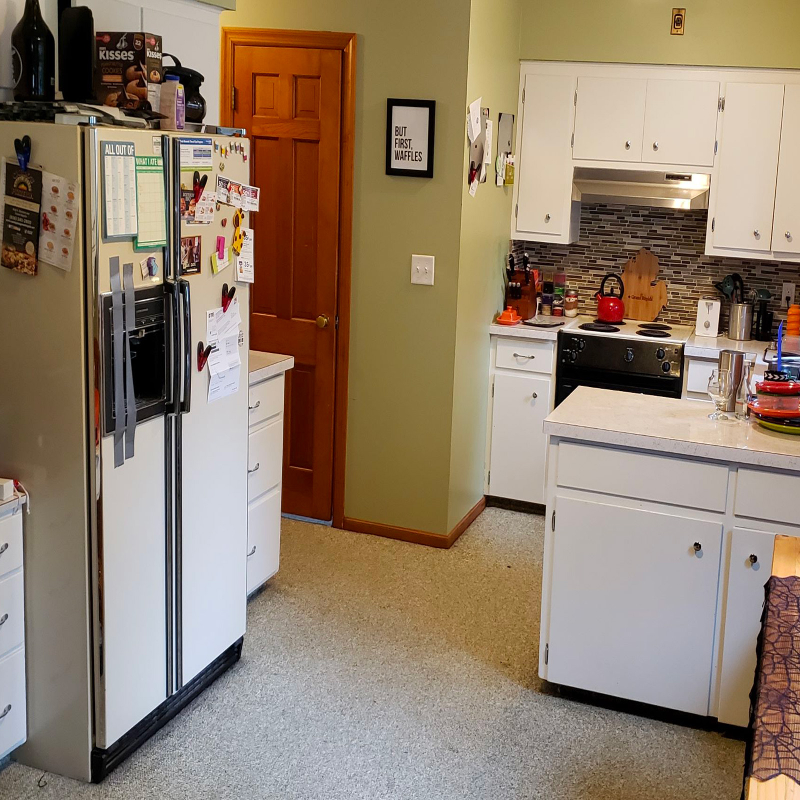 Entry 2 - With outdated cabinetry & poor design this kitchen could use a facelift