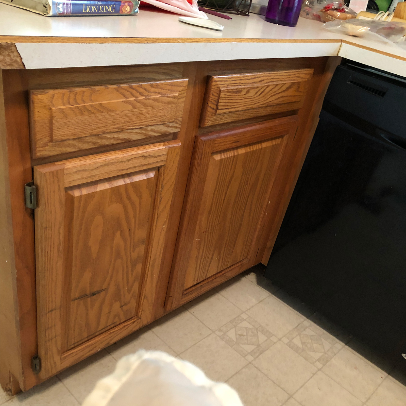 Entry 3 - These worn out cabinets make for a tired kitchen