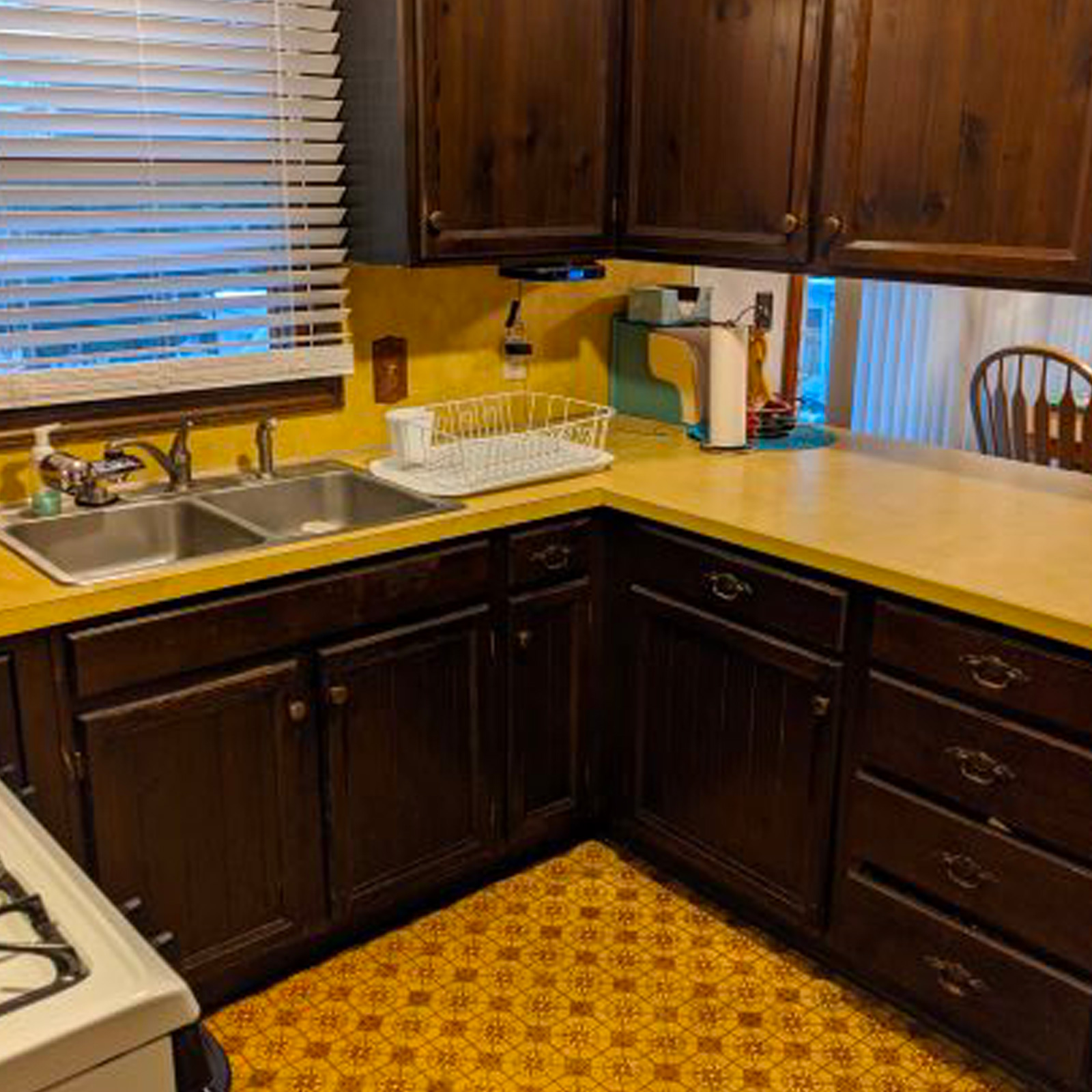 Entry 98 - These outdated cabinets & colors quickly date this kitchen