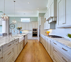 UltraCraft Cabinetry Style: Crystal Lake  Material: Maple  Finish: Melted Brie